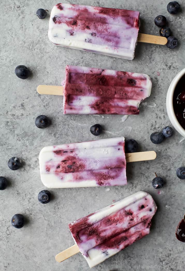 Your summer just got tastier with this creamy dreamy Paleo Blueberry Coconut Popsicles. Made from all fresh ingredients, no dairy, no refined sugar and 100% yum!