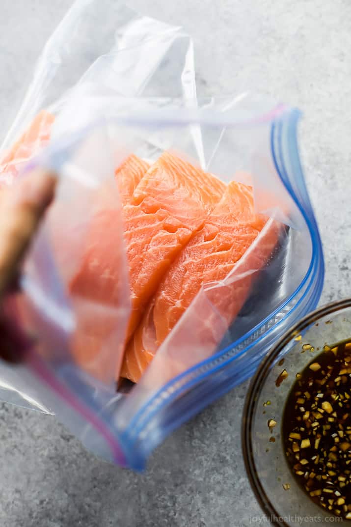 Easy Teriyaki Salmon served on a bed of Asian Noodles made with brown rice noodles, fresh veggies and a homemade Asian Sesame Dressing! A light, simple refreshing recipe for the summer! | gluten free recipes