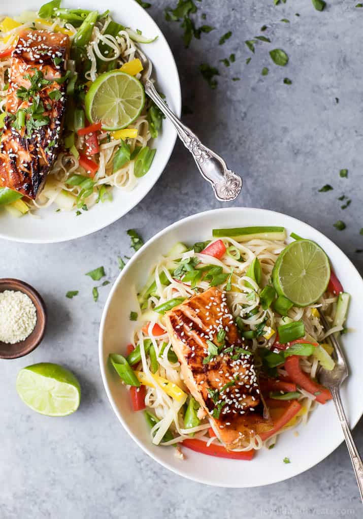 Easy Teriyaki Salmon served on a bed of Asian Noodles made with brown rice noodles, fresh veggies and a homemade Asian Sesame Dressing! A light, simple refreshing recipe for the summer! | gluten free recipes