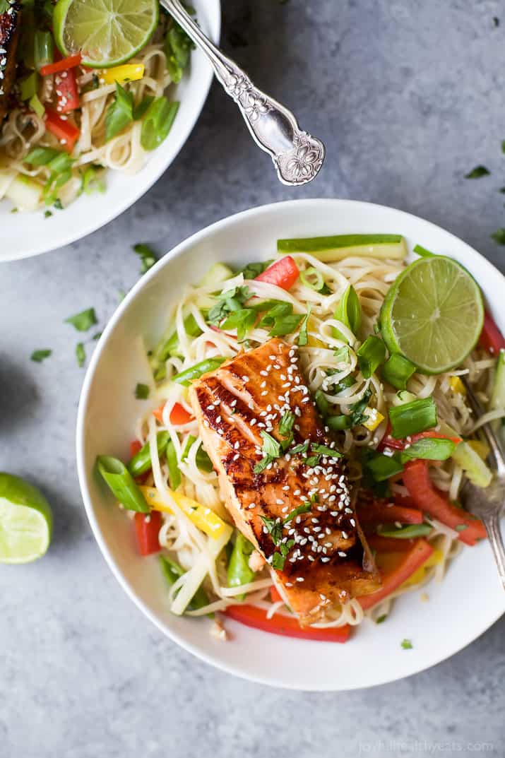 Easy Teriyaki Salmon served on a bed of Asian Noodles made with brown rice noodles, fresh veggies and a homemade Asian Sesame Dressing! A light, simple refreshing recipe for the summer! | gluten free recipes