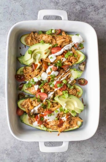 30 Minute BBQ Chicken Zucchini Boats - loaded with flavor, low in calories and high in protein. The perfect easy healthy recipe for a quick weeknight dinner your family will love!