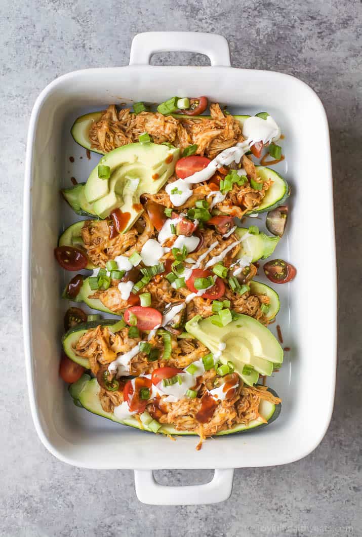 BBQ Chicken Zucchini Boats in a baking dish