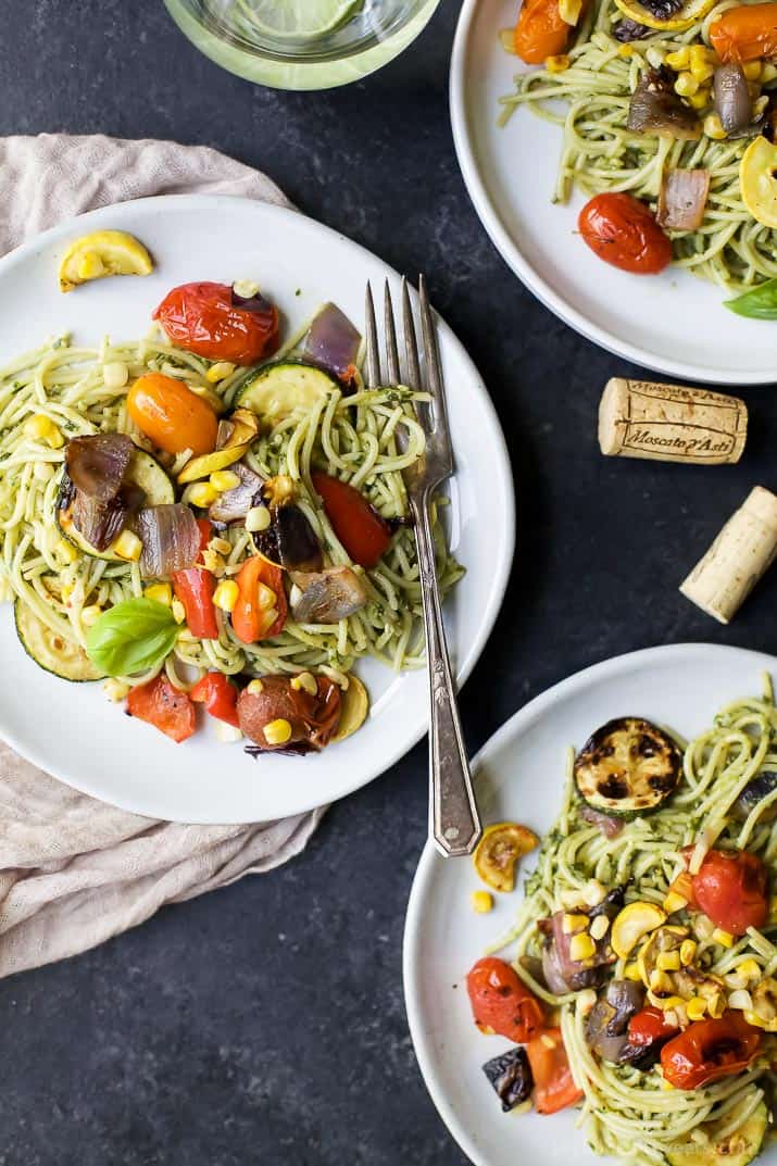 Top view of Basil Pesto Pasta tossed with fresh Grilled Vegetables on a plate