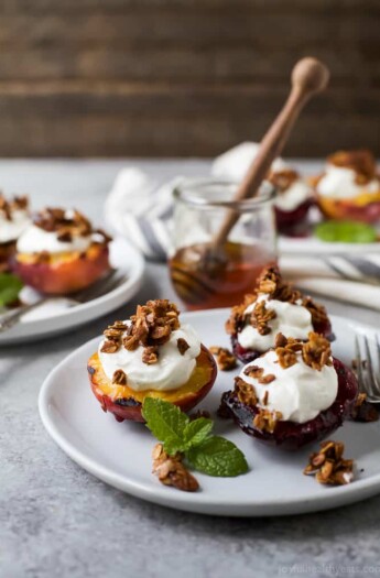 Grilled Stone Fruit topped with Vanilla Yogurt & Homemade Granola - an easy summer dessert recipe that's light, refreshing, and so easy to make! 