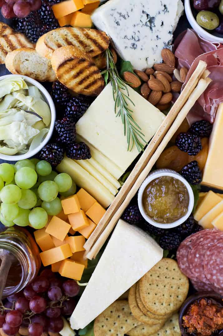 How to Make the Ultimate Cheese Board and which wines to pair it with! This appetizer recipe is easy to make and definitely a show stopper! | #ad #UndeniablyDairy