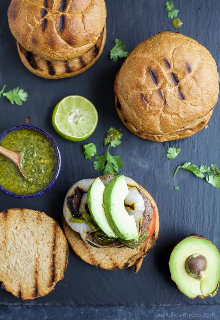 Zesty Chimichurri Burgers topped with creamy avocado and roasted poblanos are the perfect bold flavored burger for the summer!