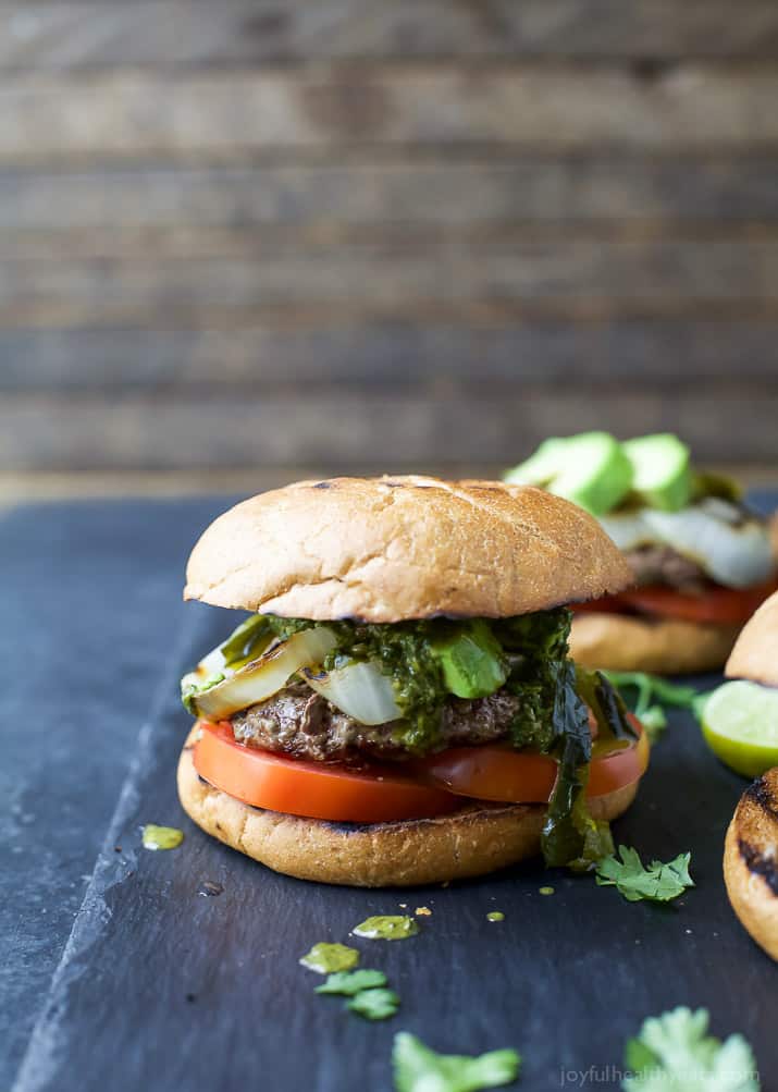 Zesty Chimichurri Burgers topped with creamy avocado and roasted poblanos are the perfect bold flavored burger for the summer!