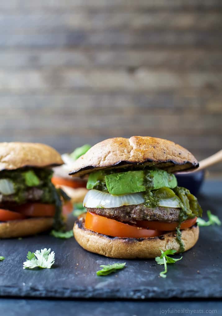 Zesty Chimichurri Burgers topped with creamy avocado and roasted poblanos are the perfect bold flavored burger for the summer!
