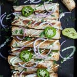 Cheesy Butternut Squash Chicken Taquitos drizzled with an Avocado Crema, a fun fall recipe the family will love. These chicken taquitos are made in 35 minutes and each serving is has 28 grams protein. #UndeniablyDairy #ad @DairyGood