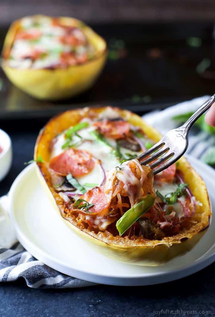 Supreme Pizza Stuffed Spaghetti Squash - the perfect comfort food recipe only 193 calories per serving and loaded with flavor! Pizza never tasted so good AND guilt free! #ad