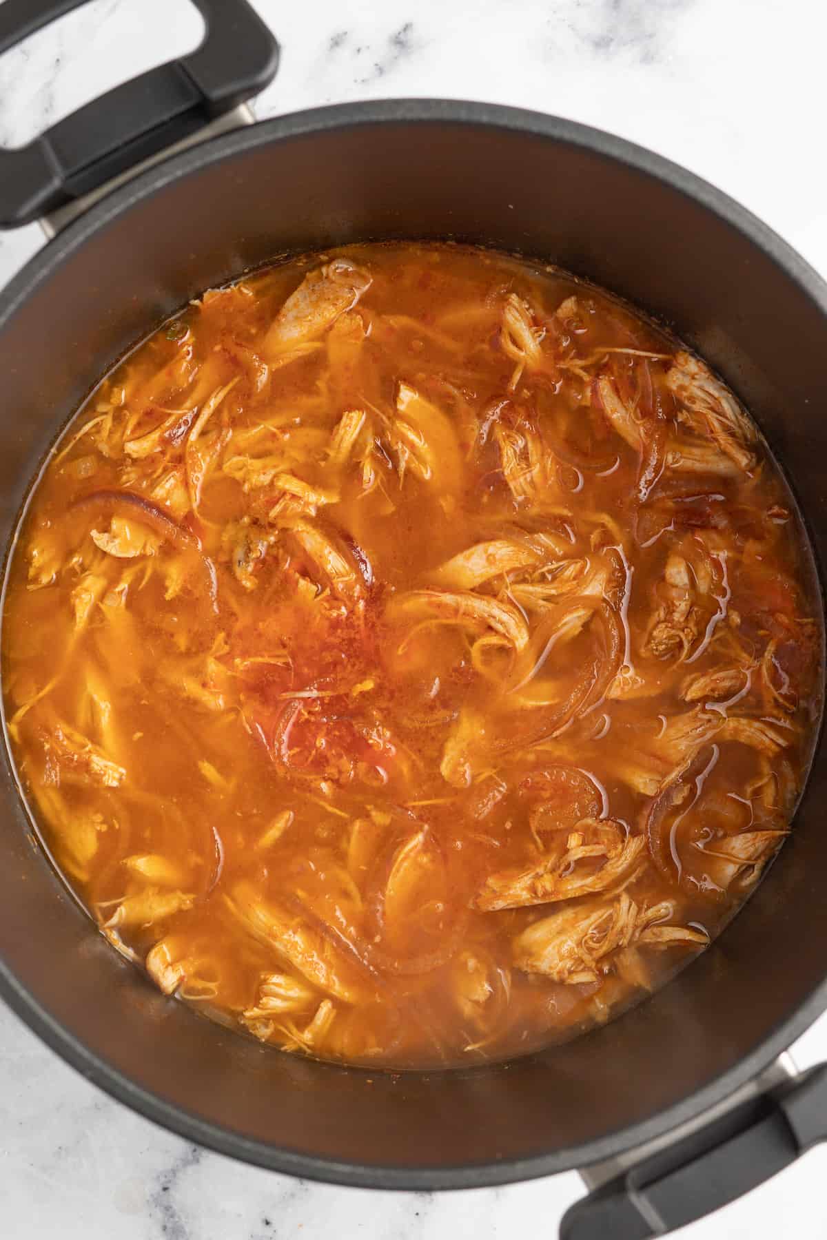 cooked chicken in ، with broth