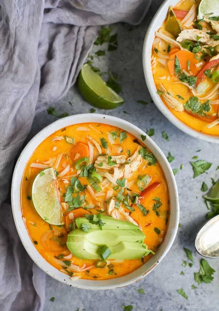 30 Minute Thai Chicken Noodle Soup filled with curry and coconut flavor, chicken, veggies and rice noodles! An epic soup recipe that will soon be your families favorite + it's gluten free!