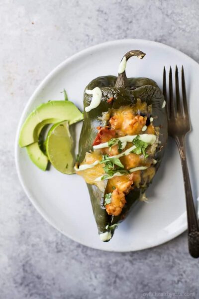 turkey stuffed poblanos with avocado crema