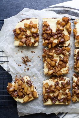 A new take on apple pie! These Gluten Free Apple Crisp Cheesecake Bars are the new dessert favorite! These cheesecake bars are creamy, dreamy, scream fall and the apple crisp topping is to die for! | #ad #UndeniablyDairy @DairyGood