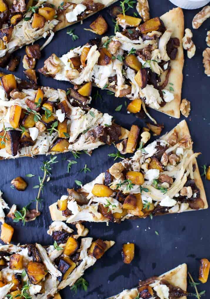 Slices of Butternut Squash Chicken Flatbread Pizza with balsamic caramelized onions and goat cheese