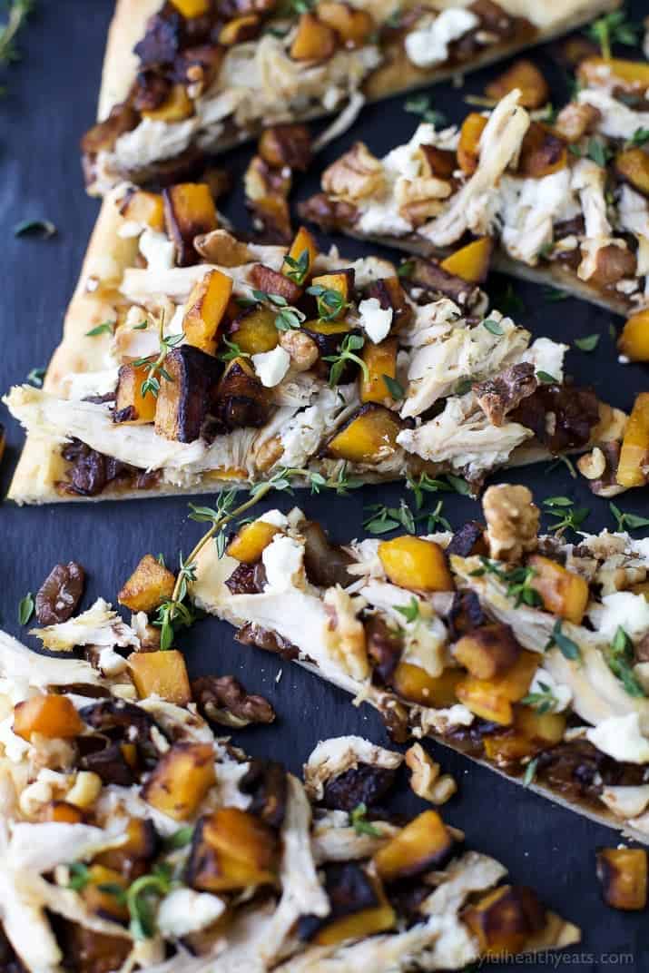 Slices of Butternut Squash Chicken Flatbread Pizza with balsamic caramelized onions and goat cheese