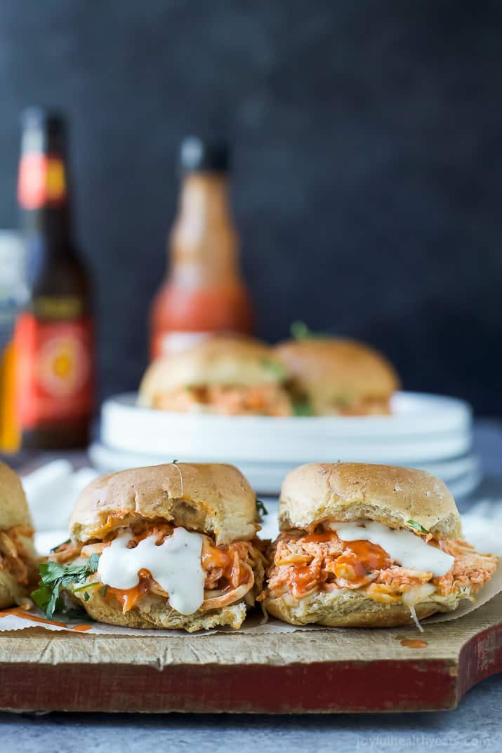 Baked Cheesy Buffalo Chicken Sliders on a wooden board