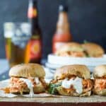 Baked Cheesy Buffalo Chicken Sliders made in less than 30 minutes and using only 5 ingredients! Loaded with Buffalo Chicken flavor these sliders are the perfect game day recipe!