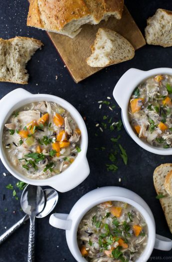 This Creamy Crock Pot Chicken and Wild Rice Soup is so easy to make and perfect for those cold winter nights with a slice of crunchy bread. This gluten free soup recipe is a must make and guaranteed to satisfy the whole family!