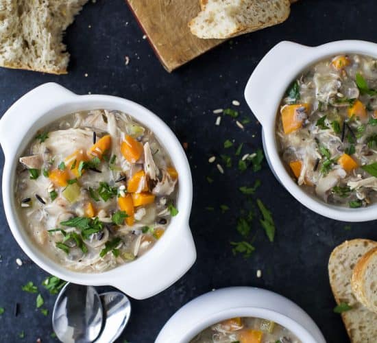 This Creamy Crock Pot Chicken and Wild Rice Soup is so easy to make and perfect for those cold winter nights with a slice of crunchy bread. This gluten free soup recipe is a must make and guaranteed to satisfy the whole family!