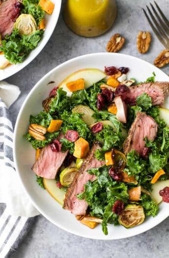 Harvest Steak Salad loaded with autumn vegetables and topped with a homemade Apple Cider Vinaigrette! This steak salad is the perfect fall inspired dinner your family will love!