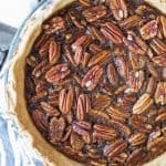 A Pecan Pie in a pie dish.