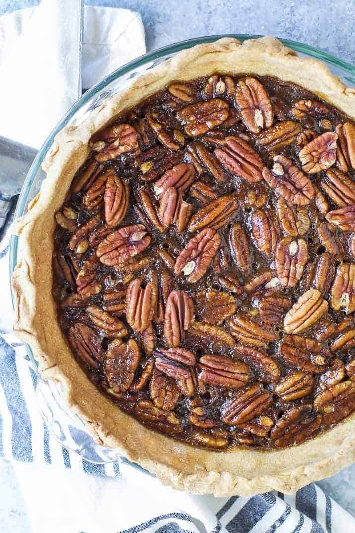 An easy & delicious Homemade Pecan Pie made without corn syrup! The perfect holiday dessert recipe that's sure to please even those Pecan Pie experts!