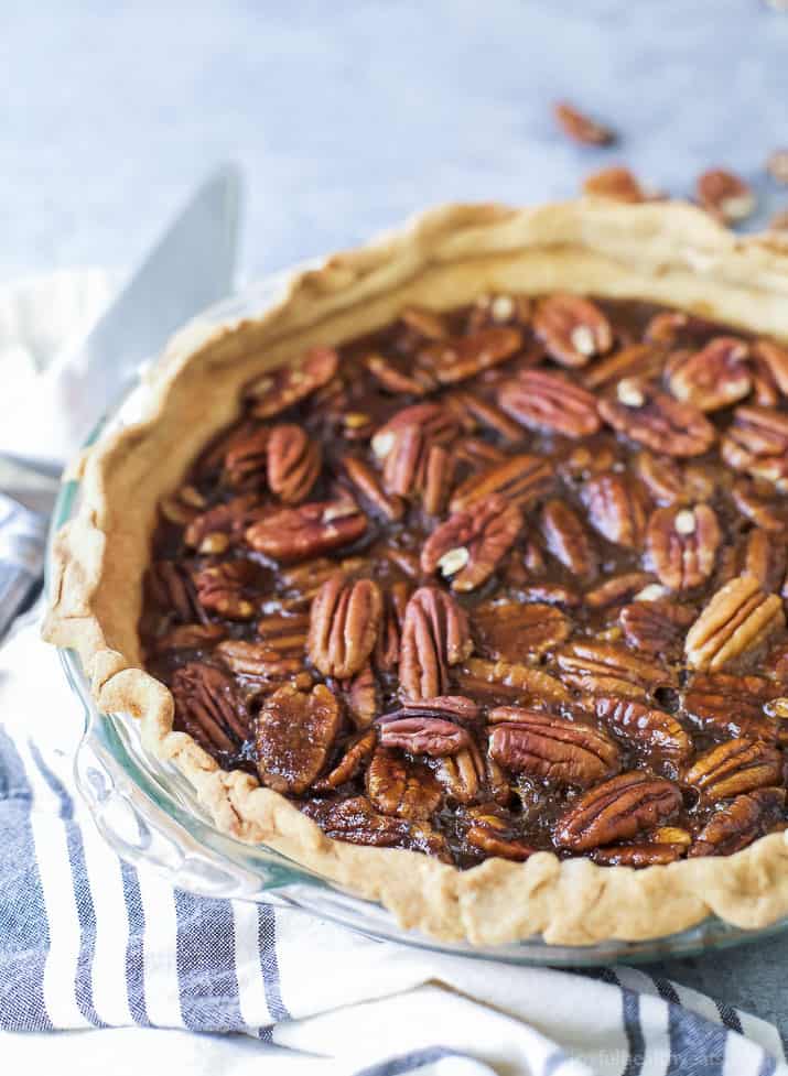 Angled photo of pecan pie recipe in a glass baking dish.