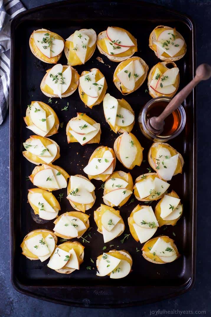 Smoked Gouda & Apple Crostini drizzled with Honey - an easy holiday appetizer with only 5 ingredients! This crostini hits all the high notes - sweet, salty, savory and crunchy! (and freakin delicious)