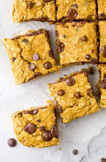 pumpkin chocolate chips spread out on a board