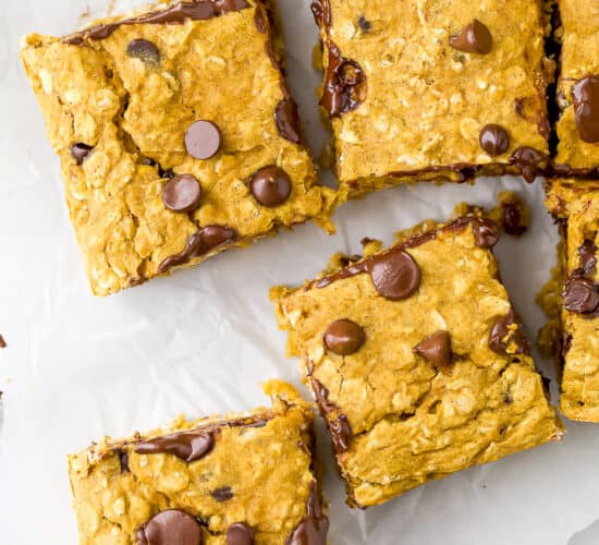 pumpkin chocolate chips spread out on a board