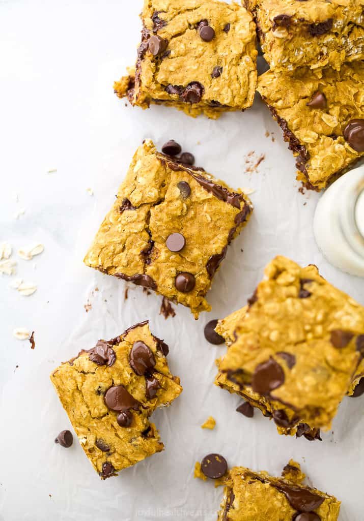 pumpkin oatmeal bars with chocolate chips on a board