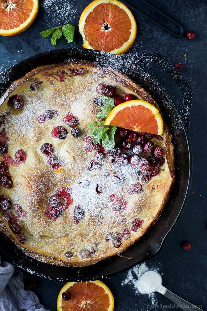 Top view of Cranberry Orange Dutch Baby in a cast-iron skillet