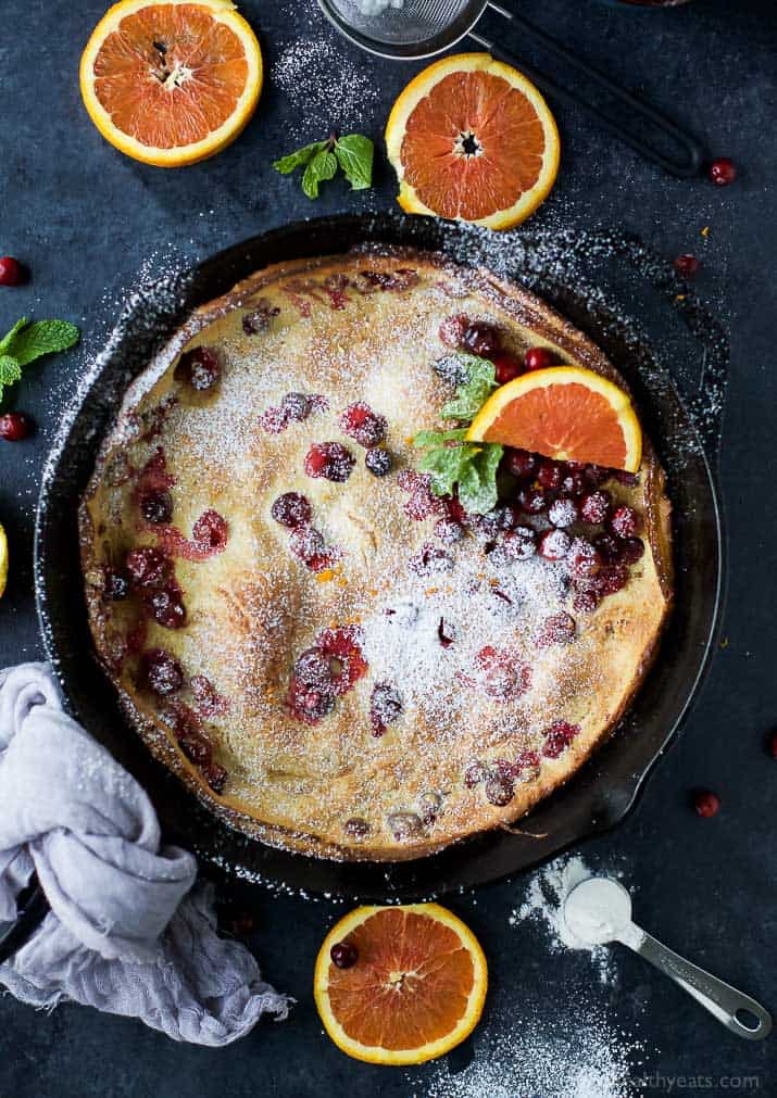 Top view of Cranberry Orange Dutch Baby in a cast-iron skillet