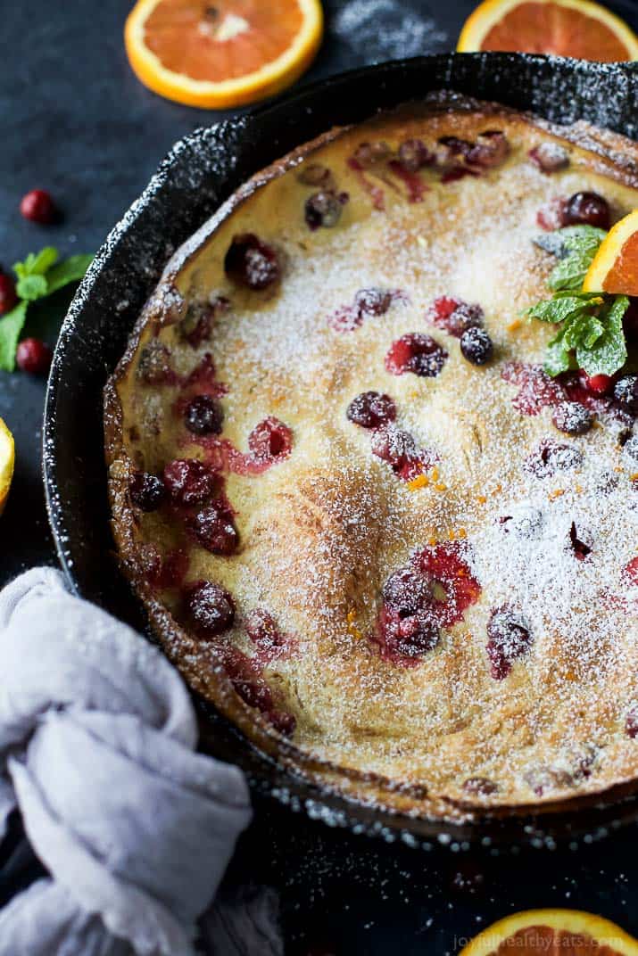 Cranberry Orange Dutch Baby in a cast-iron skillet