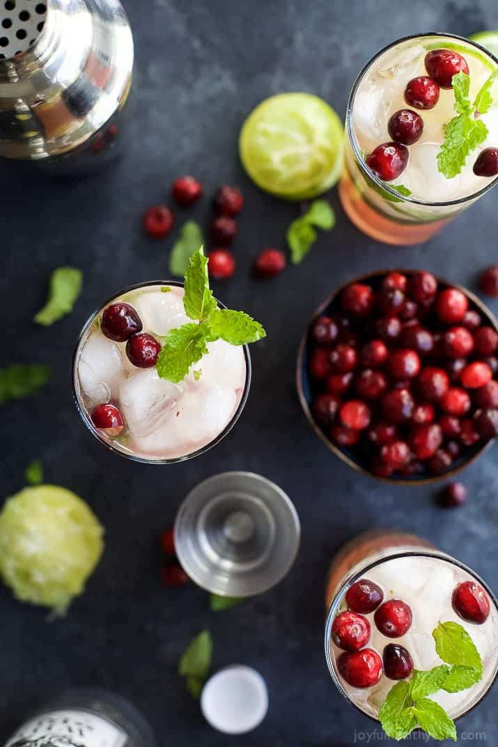 Top view of glasses of Holiday Cranberry Mojito and ingredients