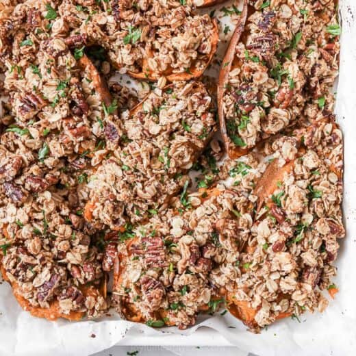 Landscape photo of twice baked sweet potatoes with cinnamon-oat streusel.