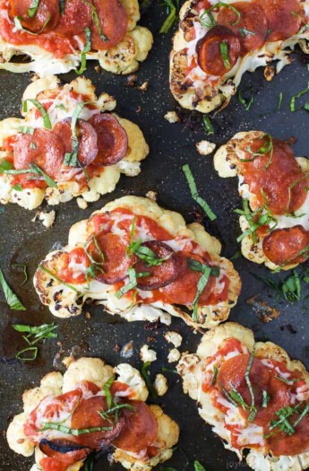 30 Minute Low Carb Cauliflower Steak Pepperoni Pizzas using only 6 ingredients. Pizza night just got a healthy upgrade, these Cauliflower Pizzas are 116 calories per serving and downright delicious!