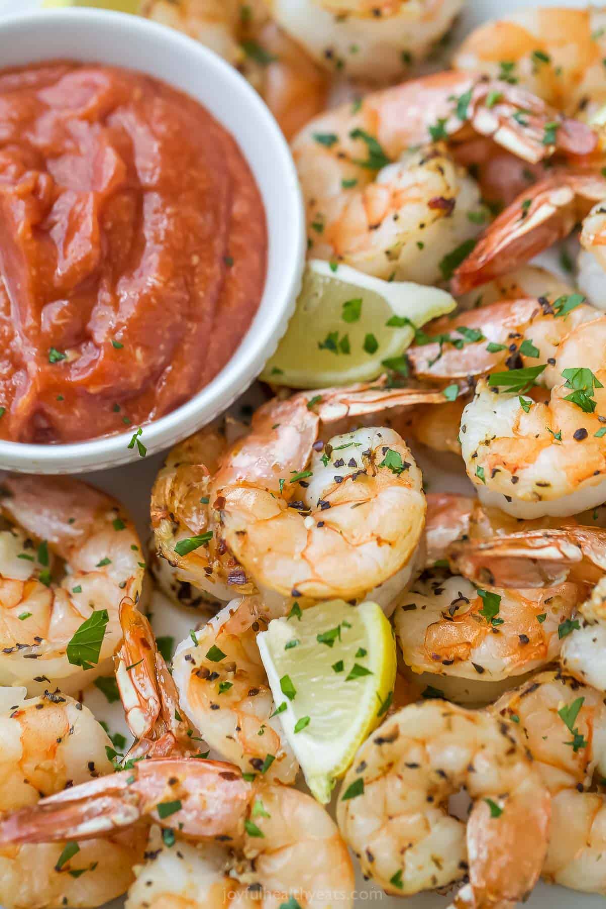 https://www.joyfulhealthyeats.com/wp-content/uploads/2017/12/Garlic-Herb-Roasted-Shrimp-with-Cocktail-Sauce-web-12.jpg