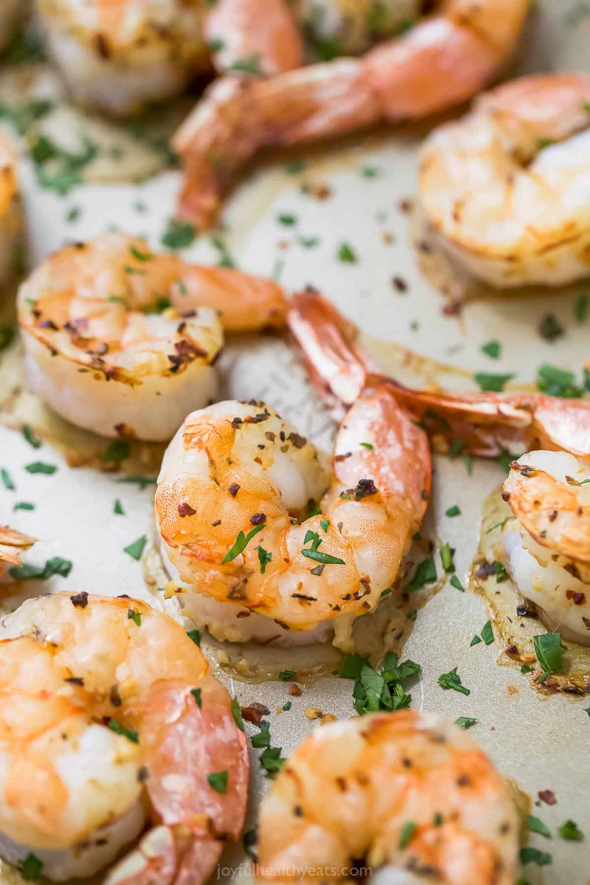 Roasted shrimp in the baking sheet. 