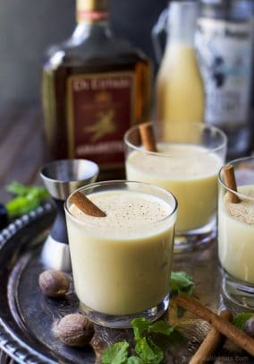 Dairy Free Holiday Spiked Eggnog with Amaretto and White Rum - a delicious creamy cocktail for the holidays. This Spiked Eggnog is a boozy treat perfect for a crowd!