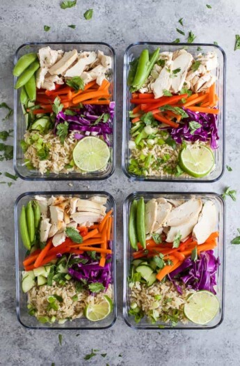 Easy Thai Chicken Grain Bowl drizzled with a Creamy Peanut Dressing. These Grain Bowls are filled with veggies, thai flavors, 17 grams of protein and come together in 15 minutes. The perfect start to a healthy new year! {gluten free}