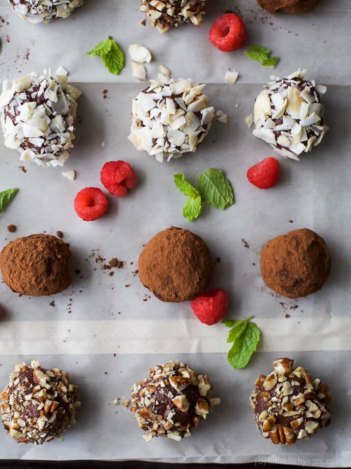 Easy Paleo Raspberry Chocolate Truffles using only 4 ingredients. Rich, decadent and everything you want in a chocolate truffle. The perfect healthy dessert for the holidays!