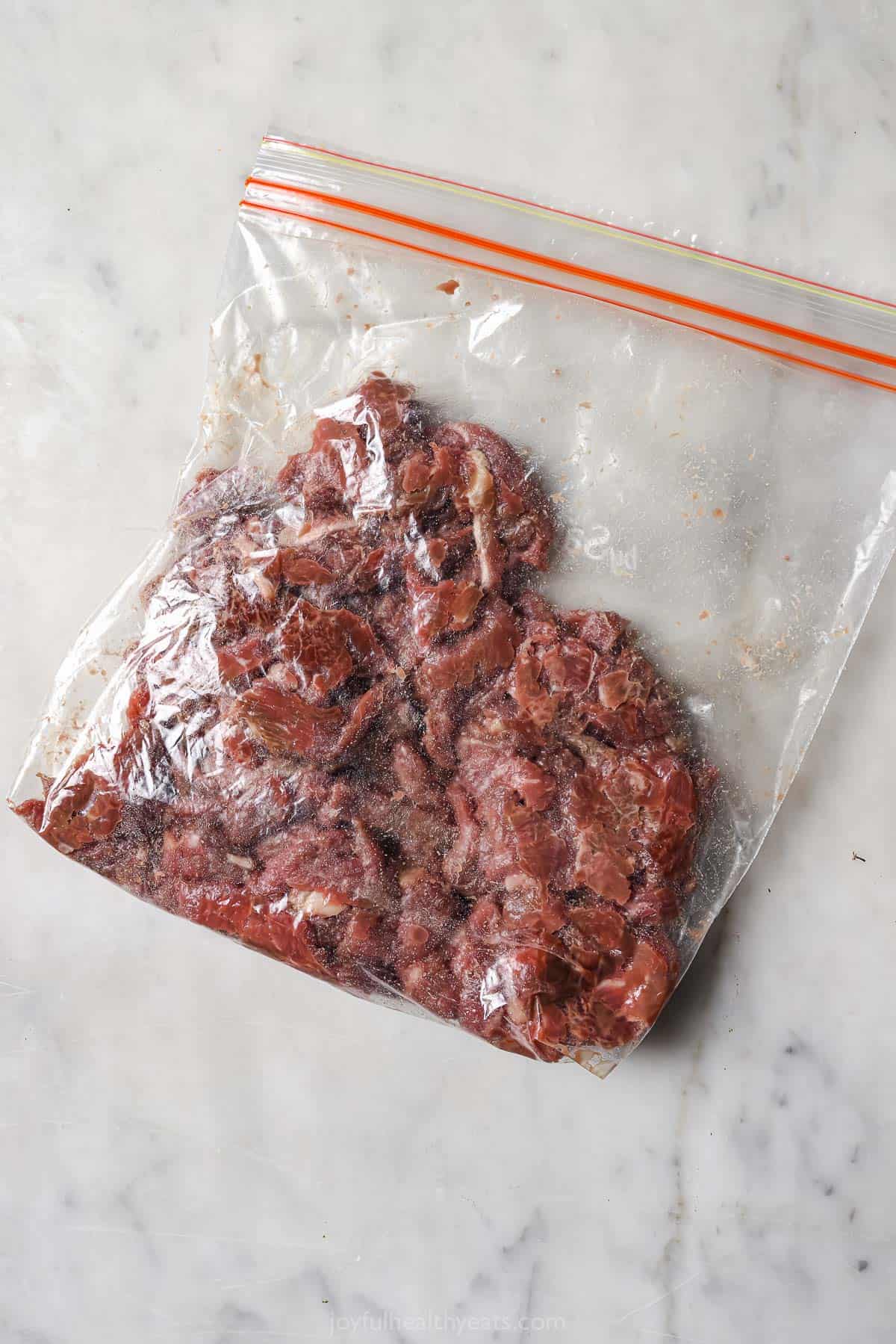Steak and arrowroot in a large Ziploc bag.