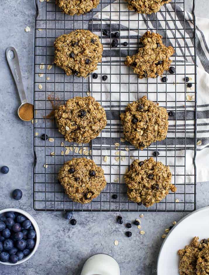 A batch of blueberry breakfast cookies on a wire cooling rack