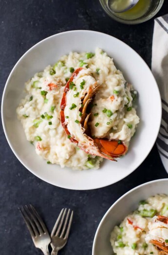 Creamy Lobster Risotto, a luscious pasta dinner filled with chunks of buttery lobster, asparagus and sweet peas. The perfect dinner for Valentines Day or a fancy Date Night in.