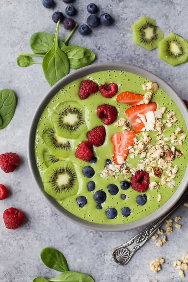 Top view of a Green Smoothie Bowl with fresh fruit and nuts