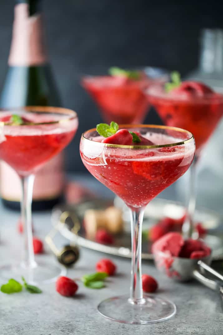 raspberry sorbet rose float in a wine glass