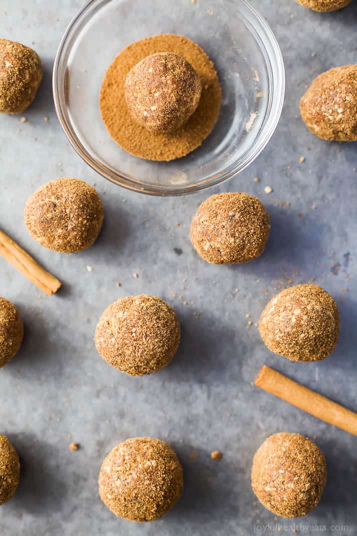 These easy Snickerdoodle Energy Balls are made in a blender and then rolled in a cinnamon coconut sugar crust. They taste just like snickerdoodle cookies and are the perfect breakfast, post workout snack or late night treat. #ad