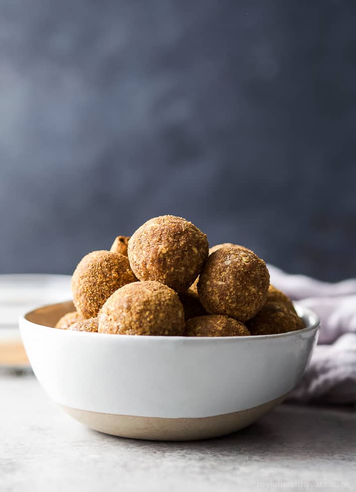 These easy Snickerdoodle Energy Balls are made in a blender and then rolled in a cinnamon coconut sugar crust. They taste just like snickerdoodle cookies and are the perfect breakfast, post workout snack or late night treat. #ad